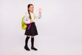 Full length body size view portrait of her she nice attractive lovely friendly cheerful cheery pre-teen girl waving hi Royalty Free Stock Photo