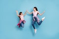 Full length body size view portrait of two nice charming attractive cheerful cheery straight-haired girls having fun Royalty Free Stock Photo