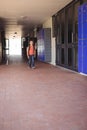 Full length of boy walking in corridor