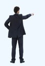 Full length of business man pointing at copyspace Royalty Free Stock Photo