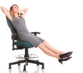 Full length business woman sitting on chair is Royalty Free Stock Photo