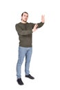 Full length of cautious man showing stop gesture with his palms, arms outstretched as deny or refuse, gesturing prohibition, no