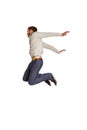 Full length of cheerful young man jumping Royalty Free Stock Photo