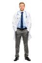 Full length of confident young doctor on white background Royalty Free Stock Photo