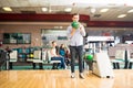 Teenage Boy Ready To Go Bowling At Alley In Club Royalty Free Stock Photo