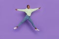 Full length image lady having fun jumping girl feel free enjoy summer weekend isolated on violet color background