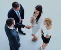 Full length image of two successful business men shaking hands with each other. Royalty Free Stock Photo