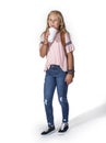 Full length isolated photo of a Smiling teen girl drinking a soda drink