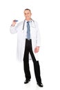 Full length male doctor holding a thermometer Royalty Free Stock Photo