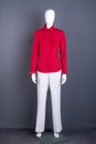 Full length mannequin in red women shirt.