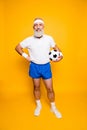 Full length of modern cool funny competetive pensioner, leader, Royalty Free Stock Photo