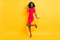 Full length phot of young excited afro girl happy positive smile look stunning isolated over yellow color background