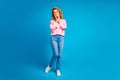 Full length photo of attractive young woman touch cheeks admire dressed stylish pink clothes isolated on blue color