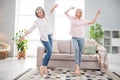 Full Length Photo Of Cheerful Funky Young Woman And Old Lady Dance Point Finger Indoors Inside House Home