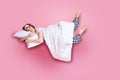 Full length photo of cheerful lady satisfied morning nap lying bed hug pillow covered blanket wear mask white t-shirt Royalty Free Stock Photo
