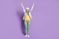 Full length photo of crazy attractive lady good mood raise arms up excited funky cheerful wear casual hat modern blue