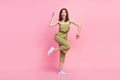 Full length photo of crazy positive lady dance wear khaki trendy outfit shoes empty space on pink color