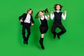 Full length photo of crazy small girl boys jump wear school uniform shoes isolated on green background