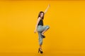 Full-length photo of dancing brunette woman wears high heel shoes. Studio portrait of lovely girl j Royalty Free Stock Photo