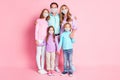 Full length photo dream family parents three kids hug embrace wear medical mask casual outfit isolated pastel color