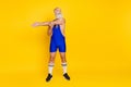 Full length photo of energetic motivated fitness coach bodybuilder do activity effort look empty space isolated on