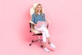 Full length photo of expert nice woman wear stylish smart casual outfit hold laptop browing information sitting chair