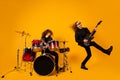 Full length photo funky crazy two people rock group team woman play drum man play bass guitar enjoy show event punk Royalty Free Stock Photo