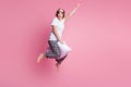 Full length photo of funny crazy lady jump high pillow between legs flight moving ahead wear sleep mask white t-shirt Royalty Free Stock Photo
