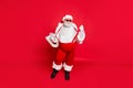 Full length photo of gorgeous white grey hair fat overweight santa in eyewear touch his suspenders feel cool wearing