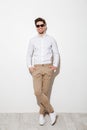 Full length photo of handsome guy dressed in casual clothing and Royalty Free Stock Photo