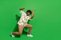 Full length photo of handsome young guy push up heavy empty space wear trendy citrus print garment isolated on green