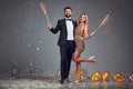 Full length photo of happy happy young loving couple standing isolated over grey background wall. Looking at camera with sparkle Royalty Free Stock Photo