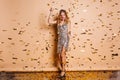 Full-length photo of magnificent caucasian girl raising glass of champagne chilling at new year event. Indoor portrait