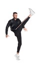 Full-length photo of a funny guy dancing in studio isolated on white background. Royalty Free Stock Photo