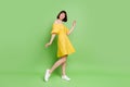 Full length photo of nice pretty young woman dance good mood summer isolated on green color background