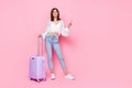 Full length photo of nice young lady baggage point empty space flight discount dressed stylish white look isolated on Royalty Free Stock Photo