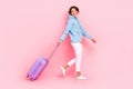 Full length photo of overjoyed lady hold bag fly abroad departure ready relax rest resort go empty space isolated on Royalty Free Stock Photo