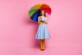 Full length photo positive cheerful lady enjoy fall spring rainy meteorology weather hold colorful bright parasol wear