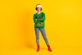 Full length photo positive girl santa claus cap look copyspace cross hands ready x-mas christmas theme party event wear Royalty Free Stock Photo