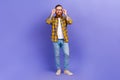 Full length photo of positive optimistic man wear trendy outfit hand touch eyewear nice quality glasses purple