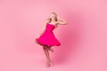 Full length photo of pretty stunning lady wear sexy dress high heels shoes dancing isolated pink color background