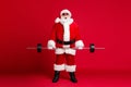 Full length photo of retired old man white beard hold barbell training shocked too heavy wear santa x-mas costume coat Royalty Free Stock Photo