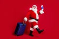 Full length photo of retired old man white beard hold suitcase tickets passport check-in airport wear x-mas santa Royalty Free Stock Photo