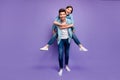 Full length photo of romantic funny funky married people have fun date hug piggyback enjoy date wear stylish trendy
