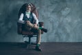 Full length photo of smart masculine old company owner man sit armchair look modern wear green dotted bow-tie socks