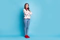 Full length photo of sweet pretty young woman dressed hearts print pullover hands arms folded isolated blue color Royalty Free Stock Photo