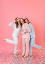 Full length photo of three beautiful teenage women 20s wearing l Royalty Free Stock Photo