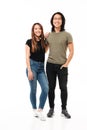 Full length photo of young charming asian couple in casual wear Royalty Free Stock Photo