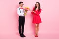 Full length photo of young couple happy smile guy present flower feeling love valentine day isolated over pastel color