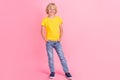 Full length photo of young small boy happy positive smile hands in pocket isolated over pink color background